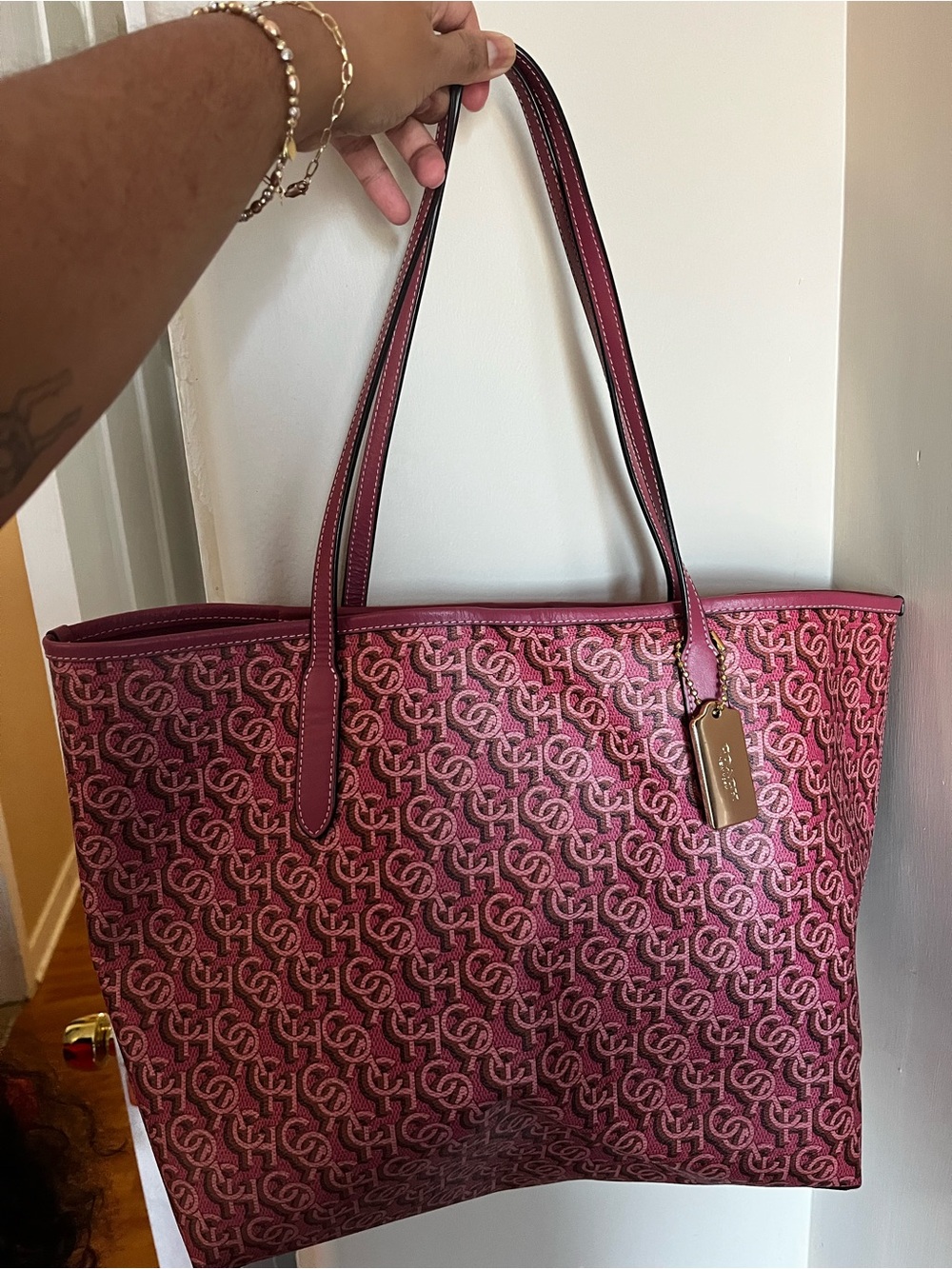 Coach tote bag! Burgundy and pink logo pattern!